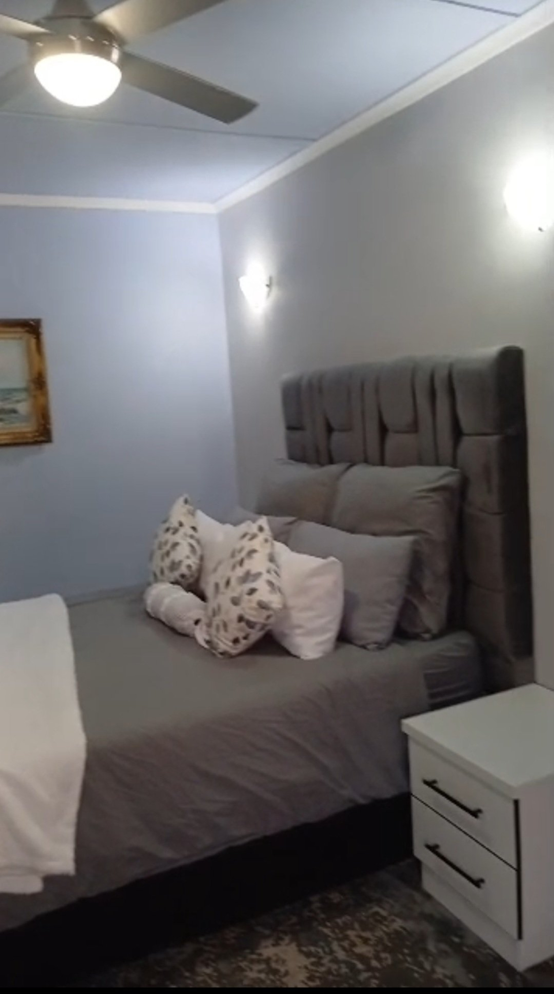 Bedroom with plush headboard