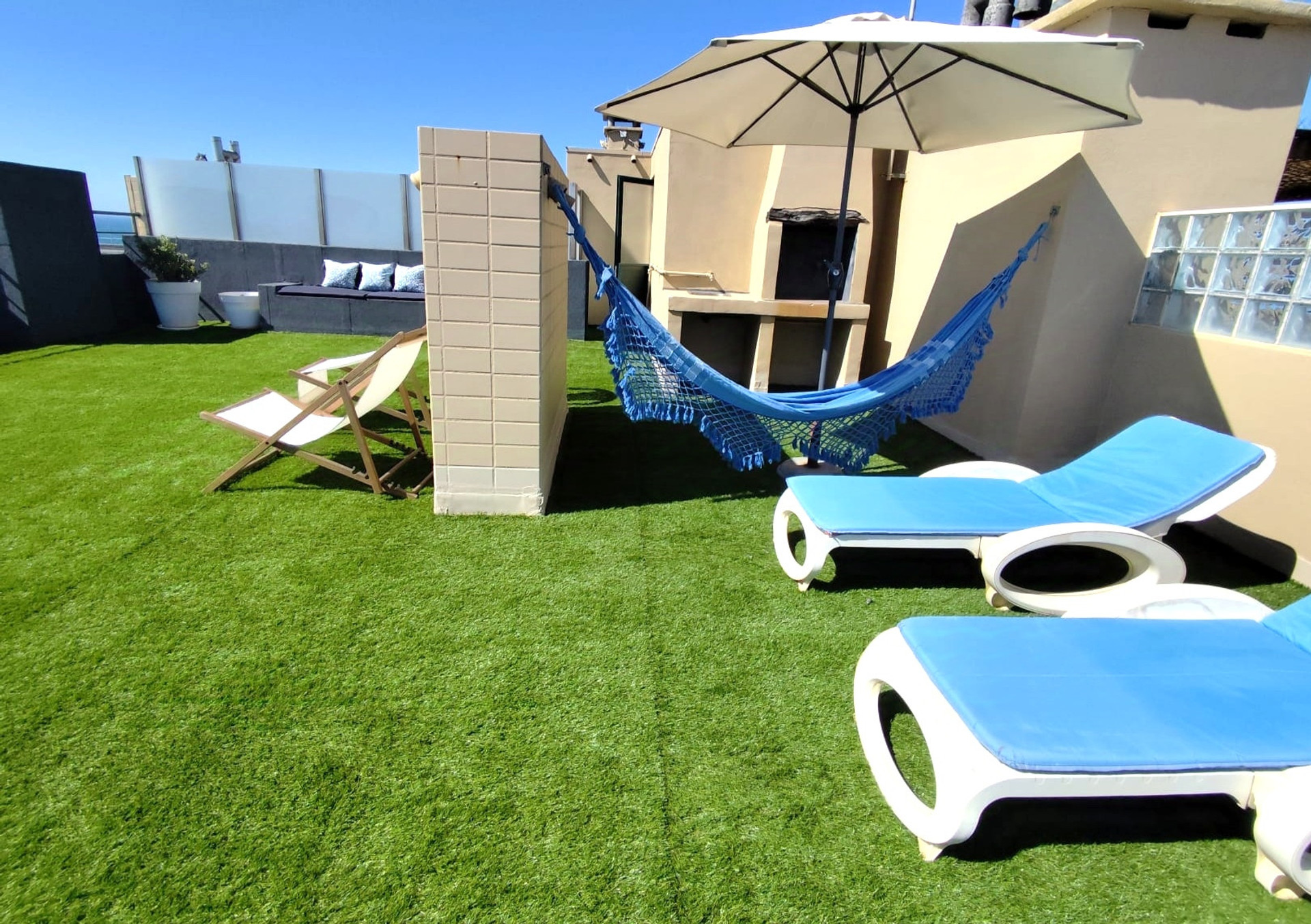 Enjoy sun loungers and a hammock for relaxation.