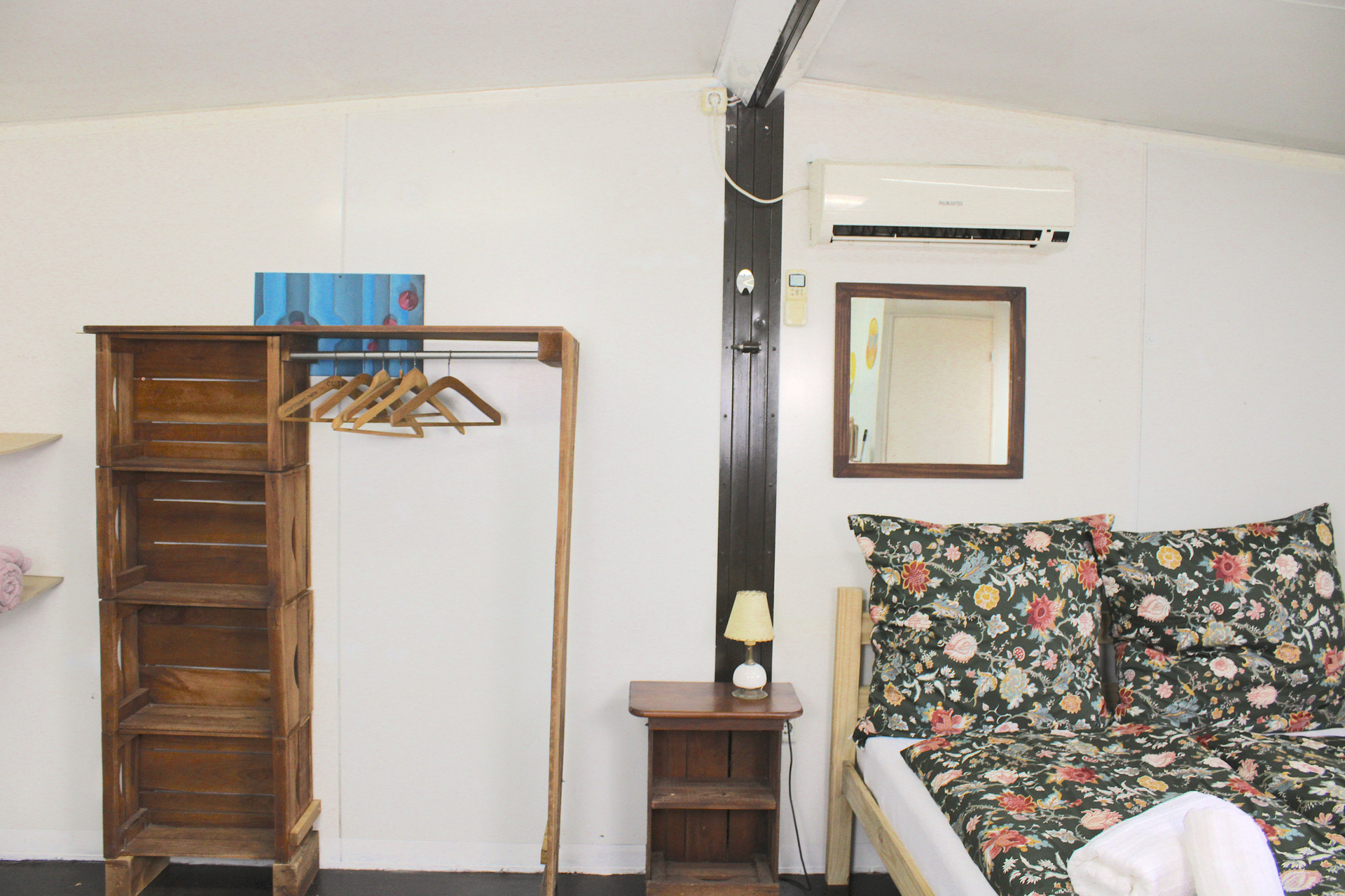 Bedroom with wardrobe and AC
