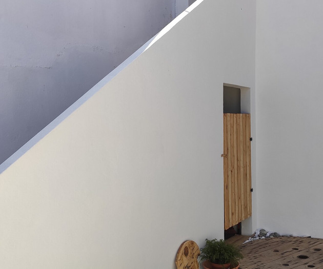 outside by the kitchen and living room