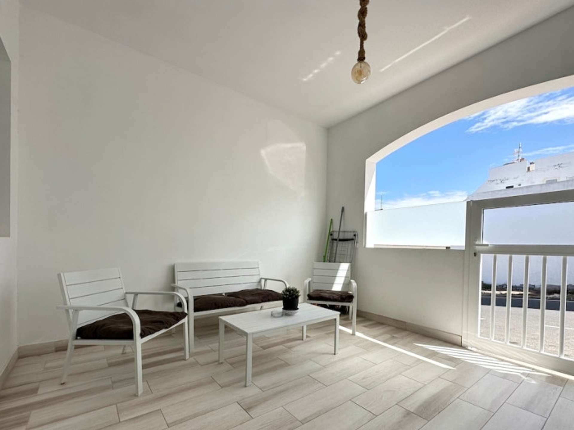 Covered terrace with seating area
