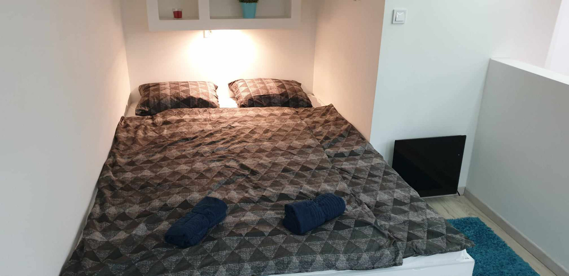 Cozy bedroom nook with bed