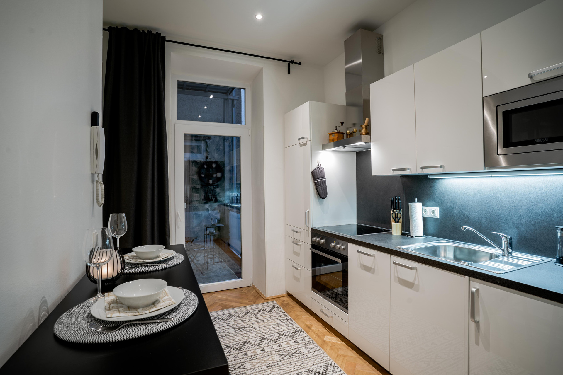 White kitchen with dining bar