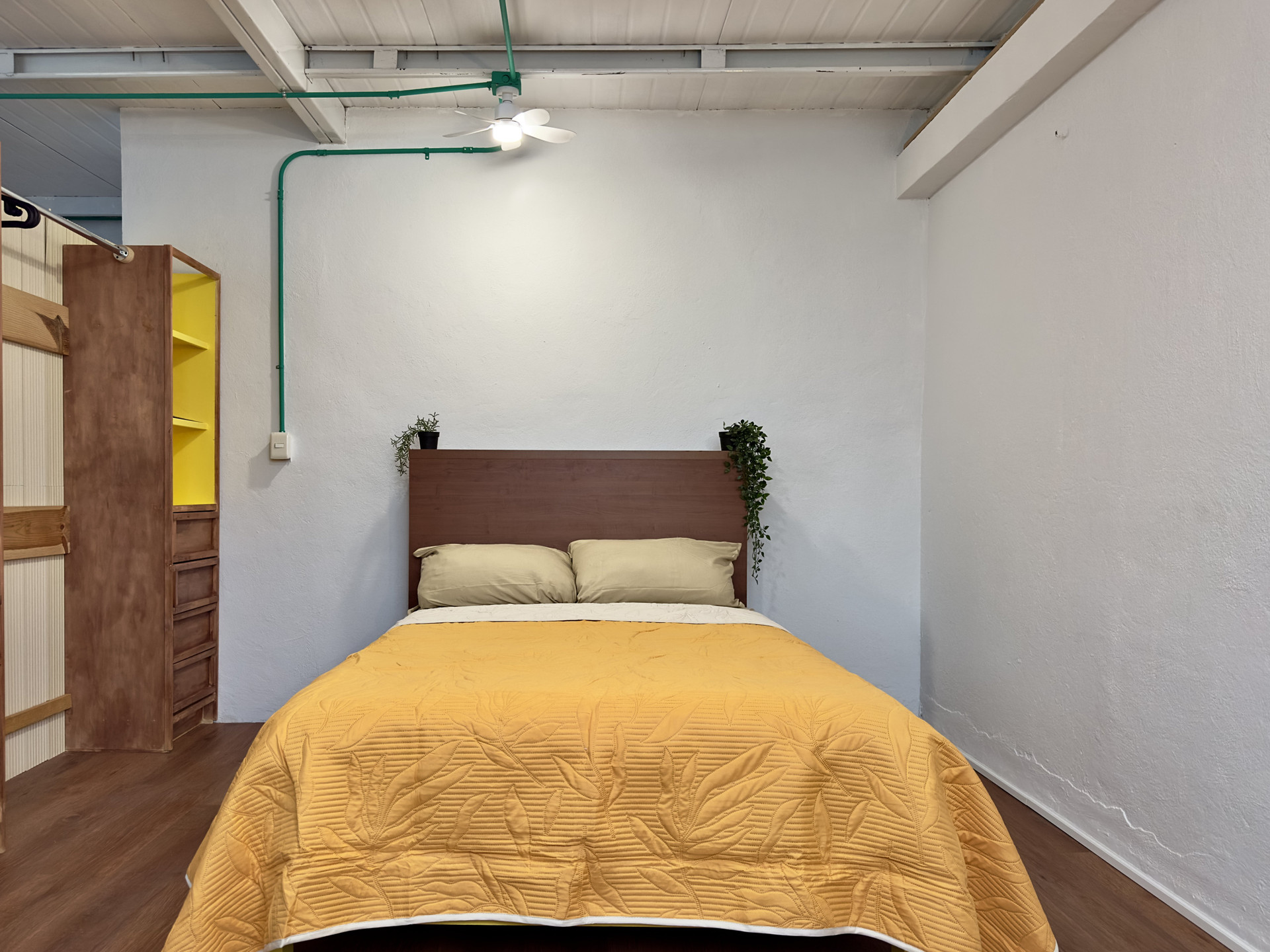 Bedroom with wardrobe and bed