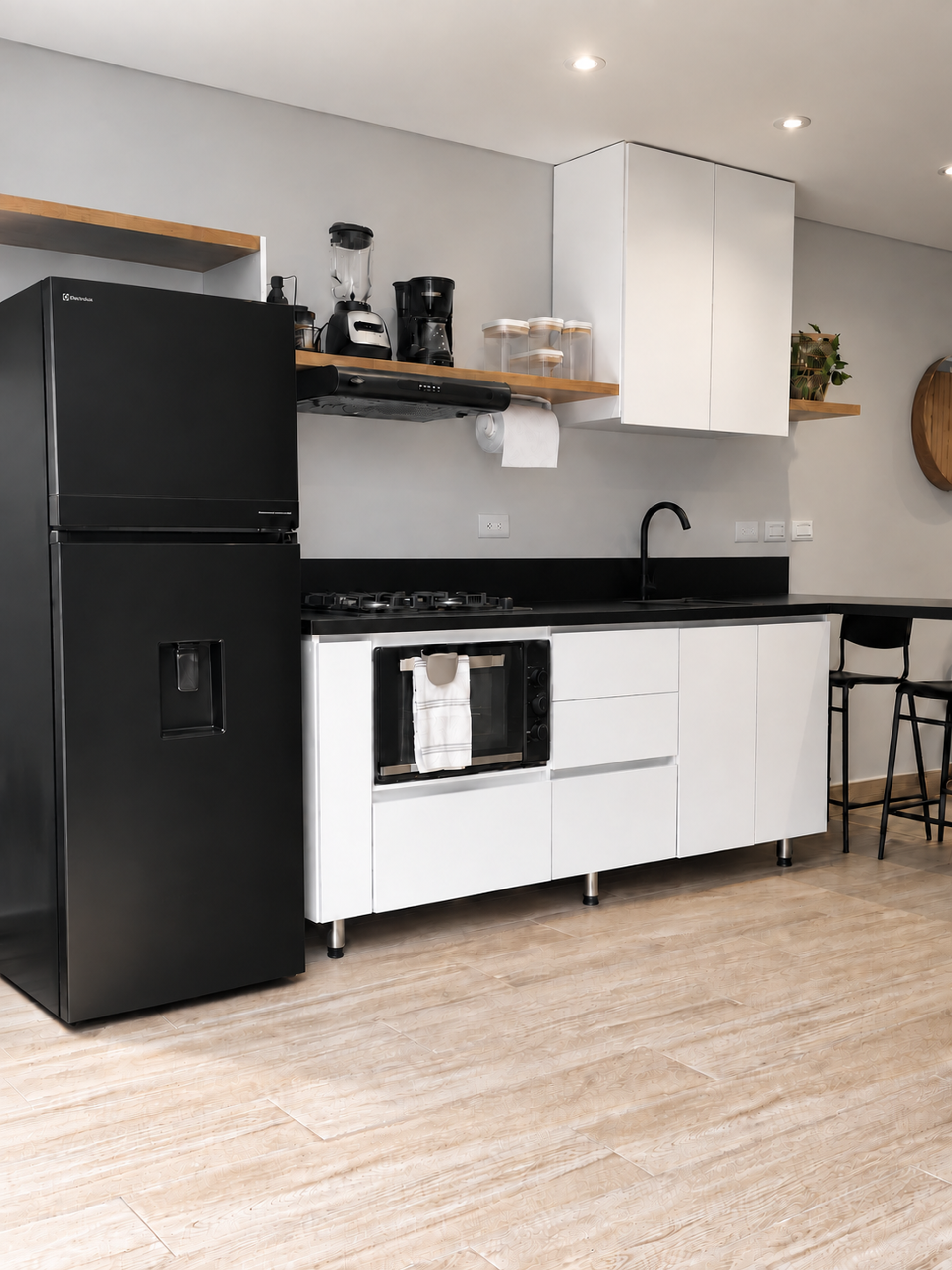 Modern kitchen with black fridge