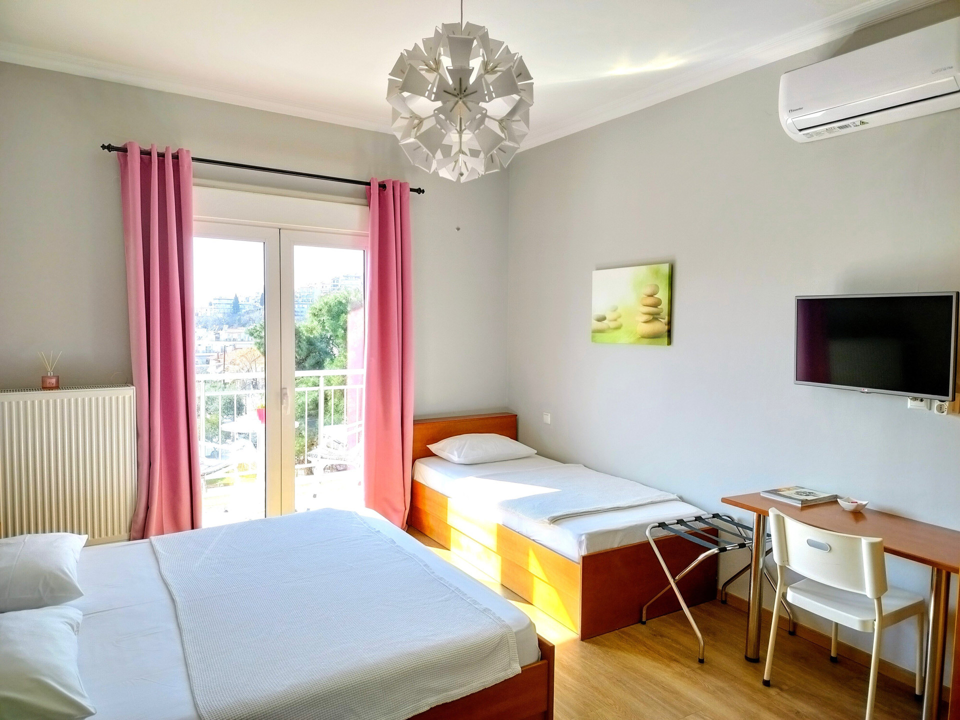 Bedroom with twin beds, city view