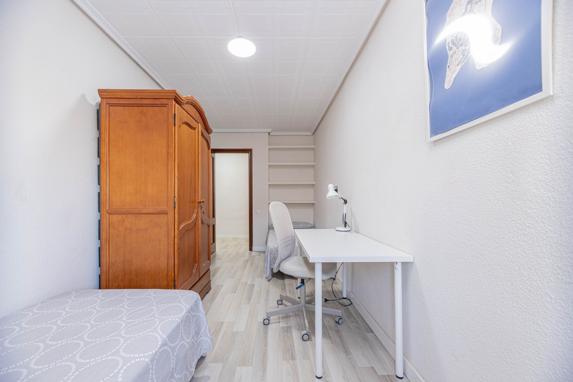 Bedroom with wardrobe and desk