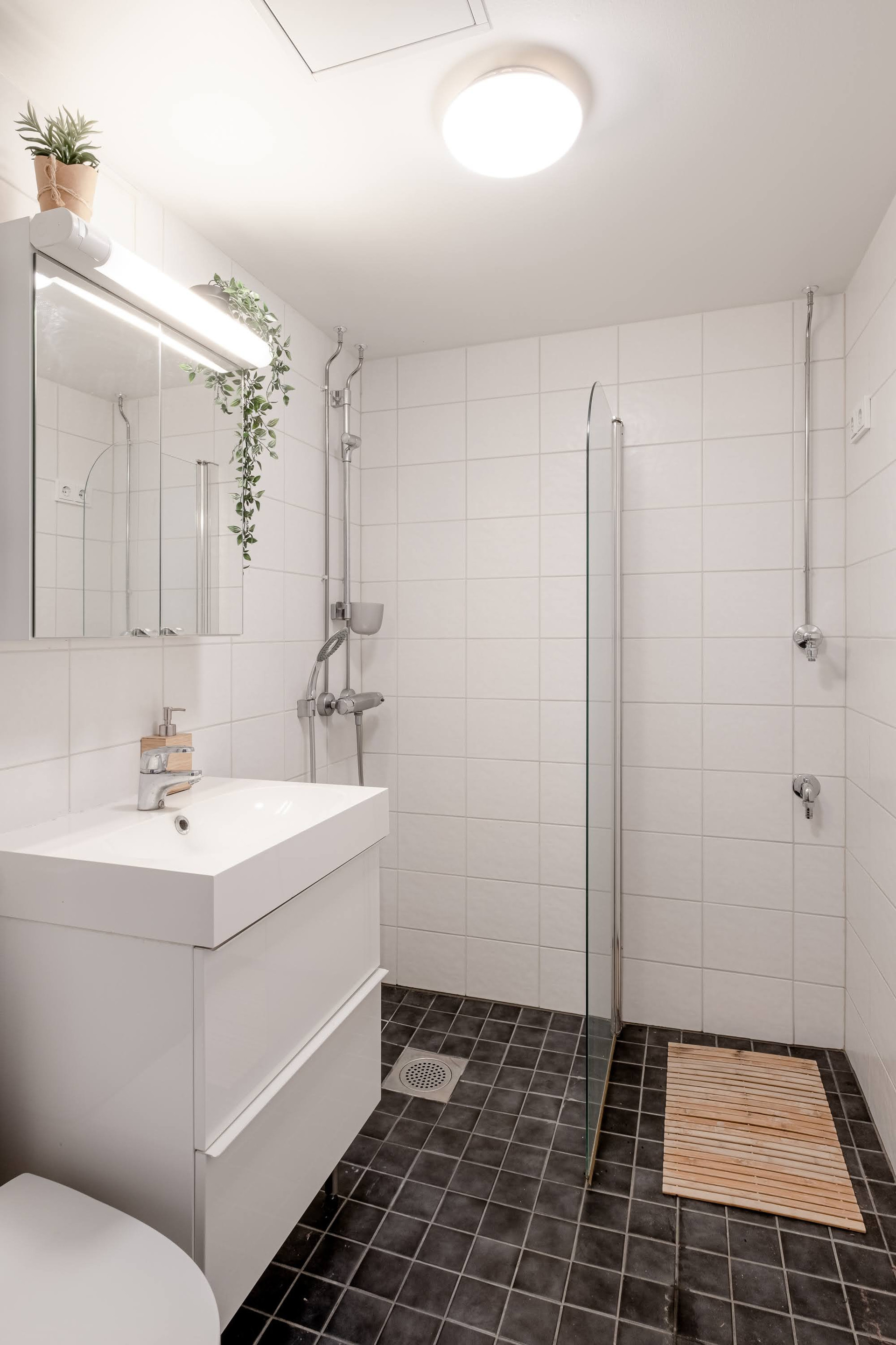 Bathroom with shower and sink