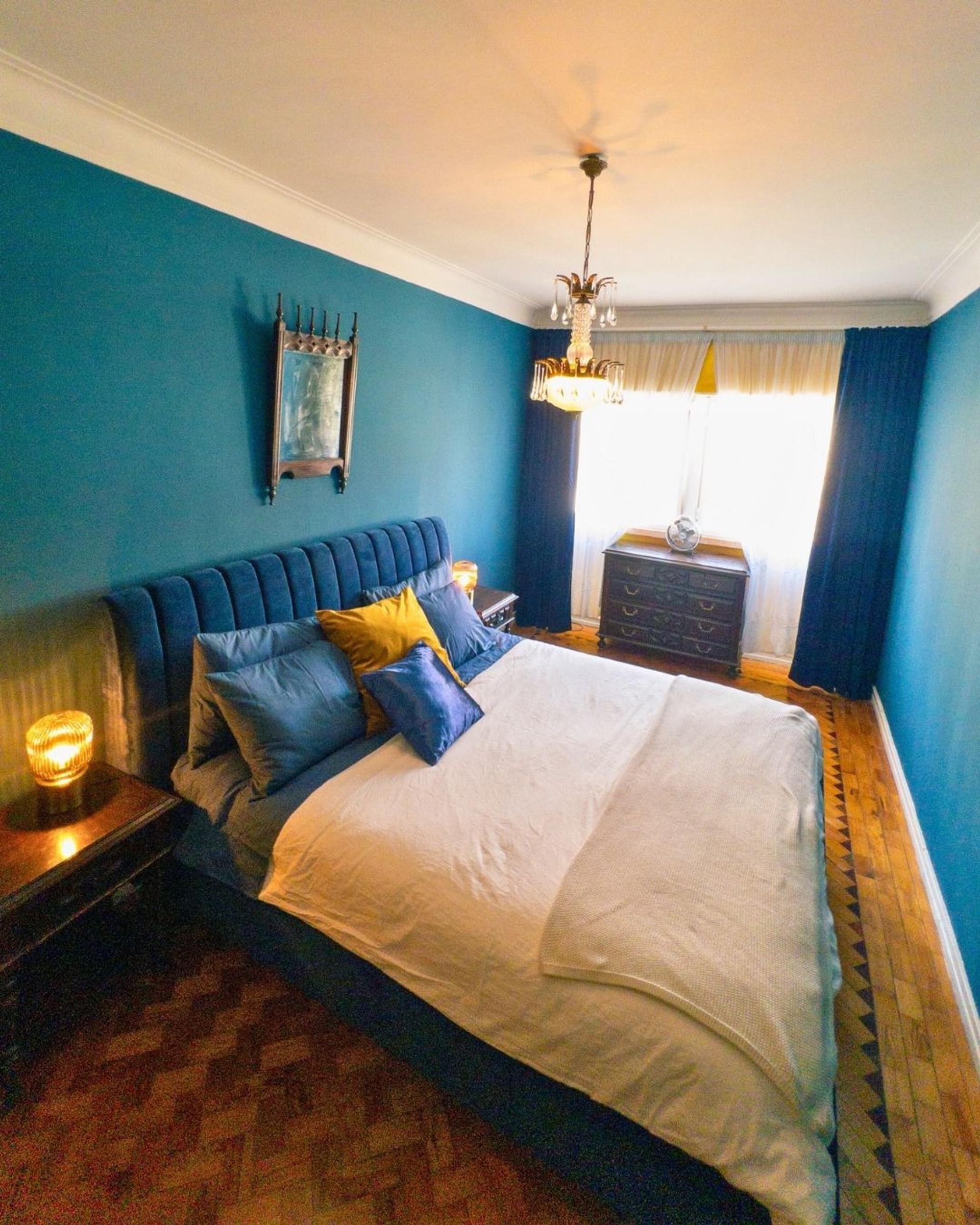 Blue bedroom wide angle view