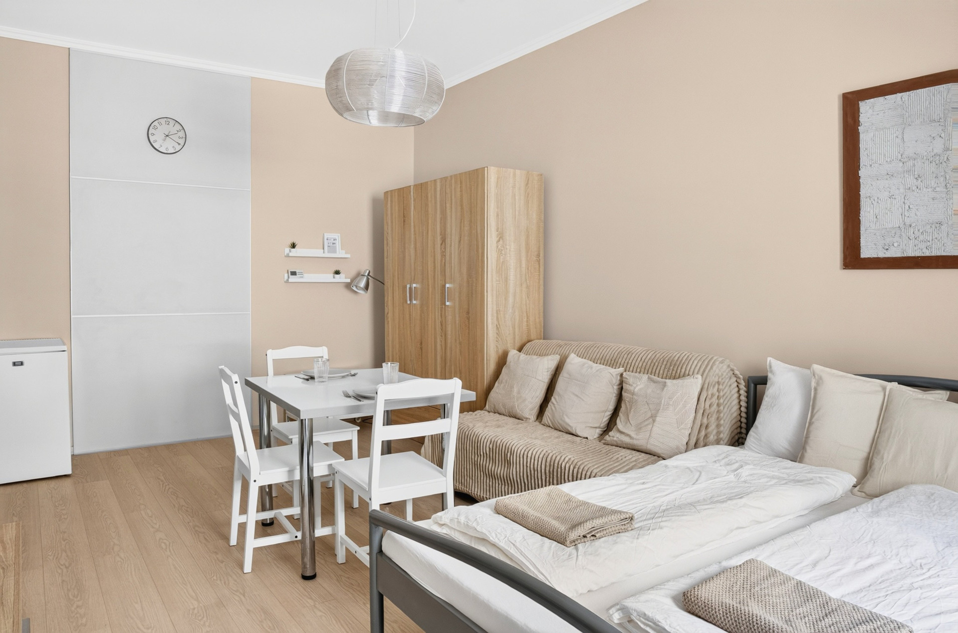 Studio room with bed sofa dining