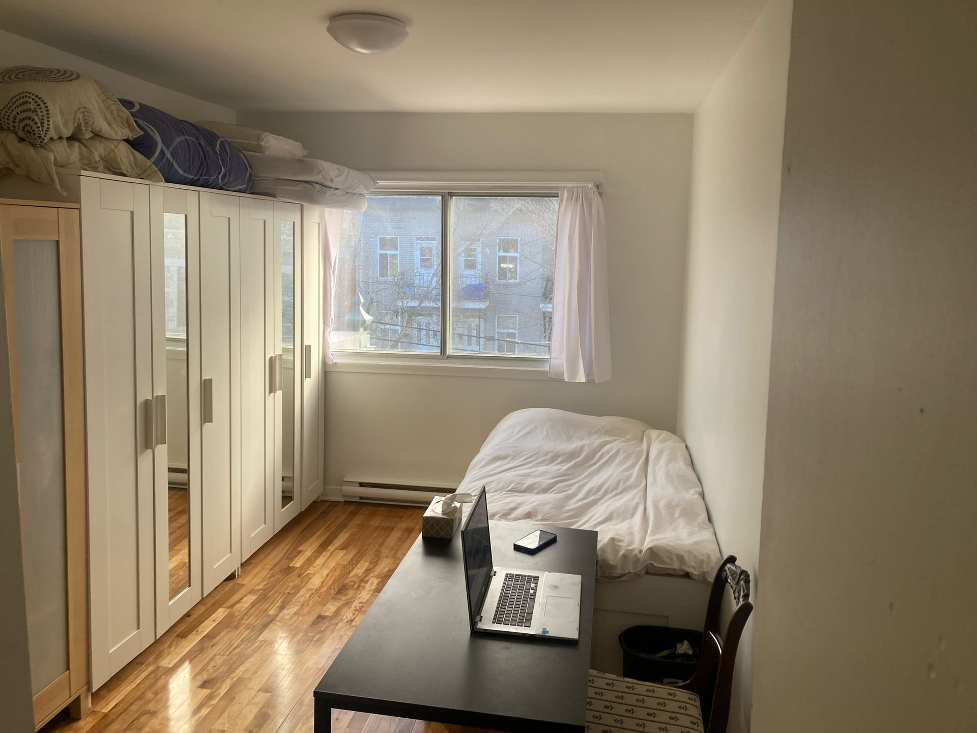 Bedroom with wardrobe and desk