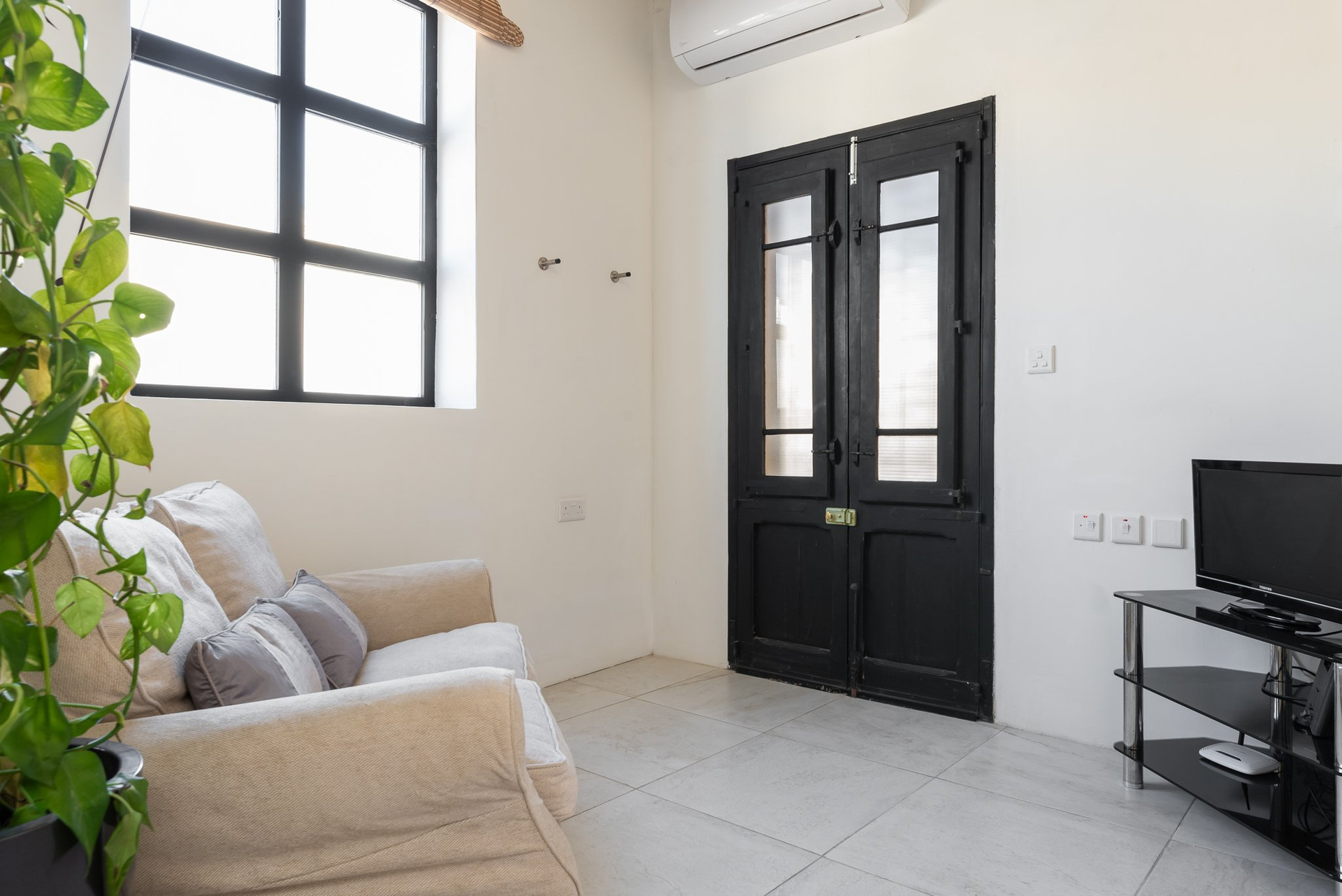 Living area with black doors