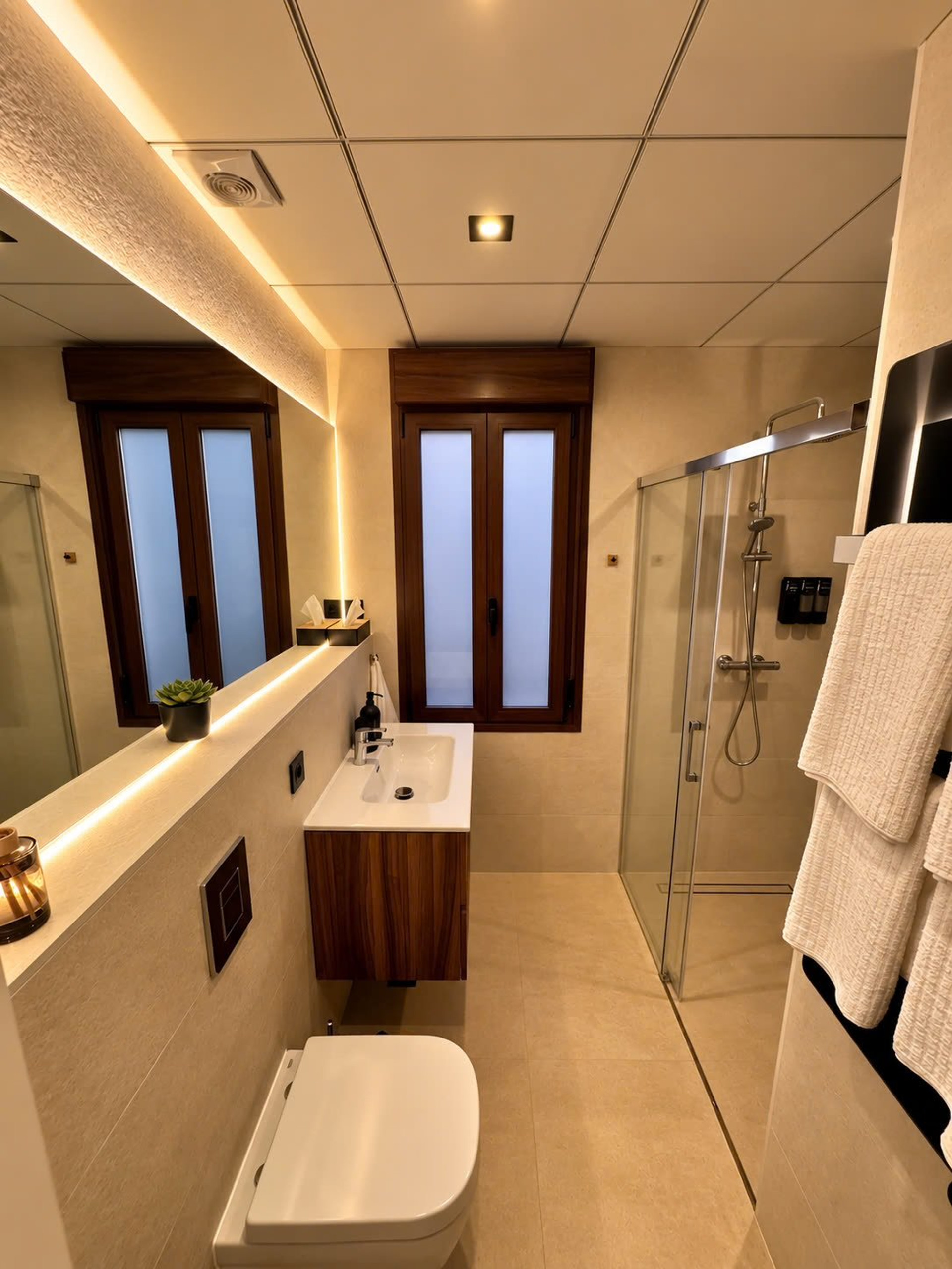 Bathroom with shower and window