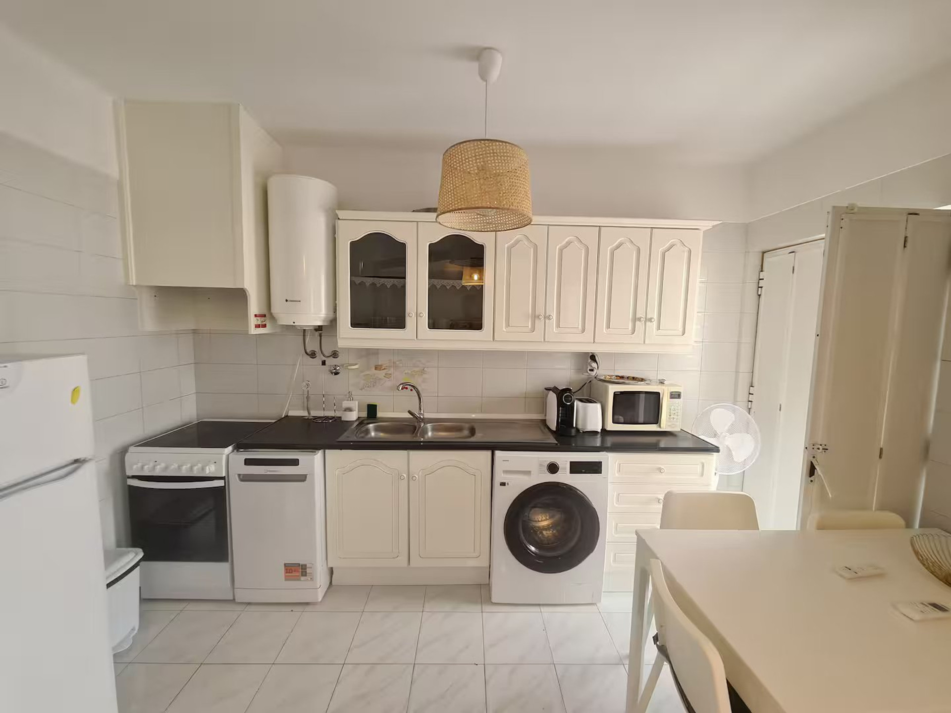 Bright kitchen with appliances