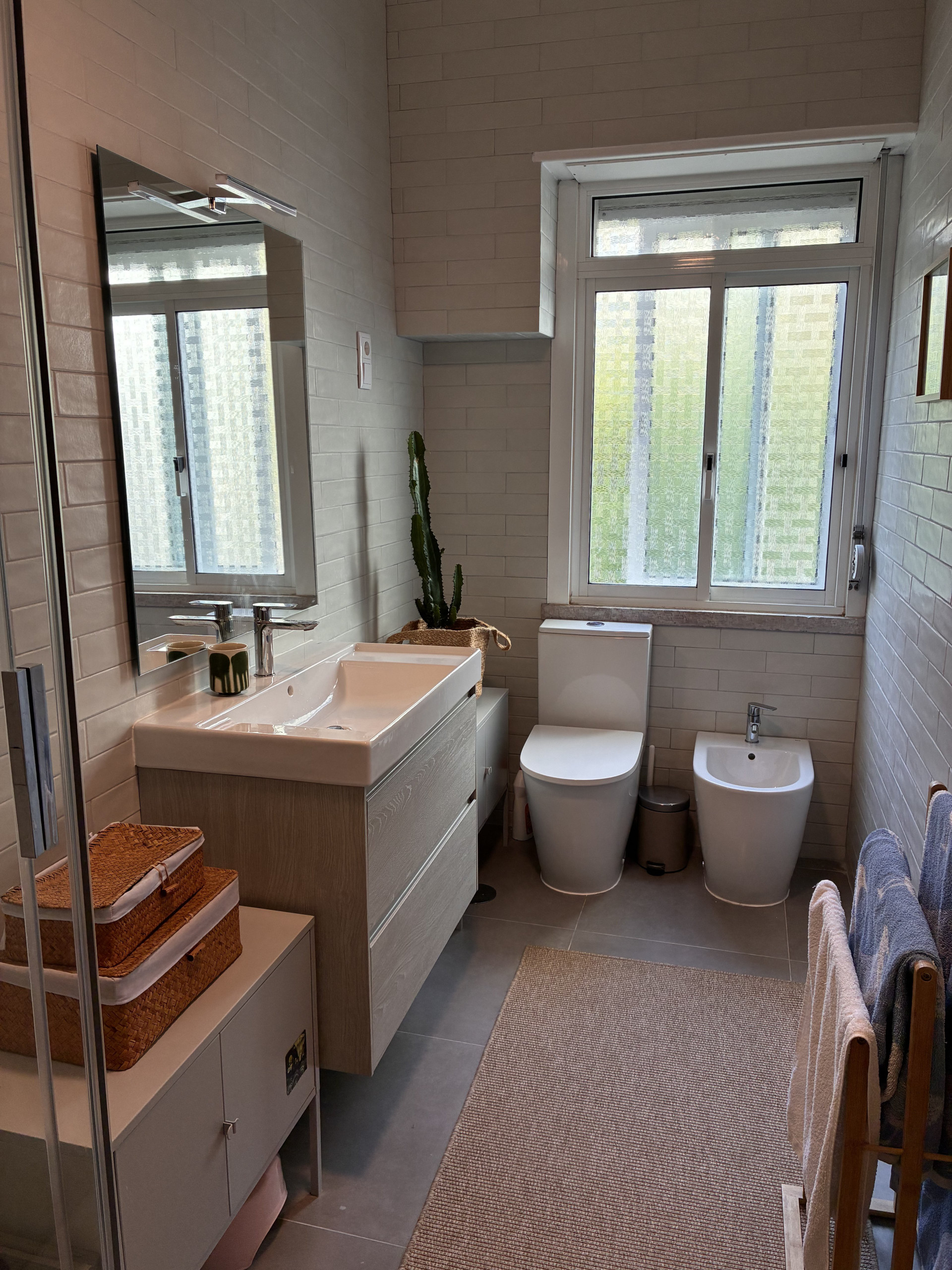 Full bathroom with sink and bidet
