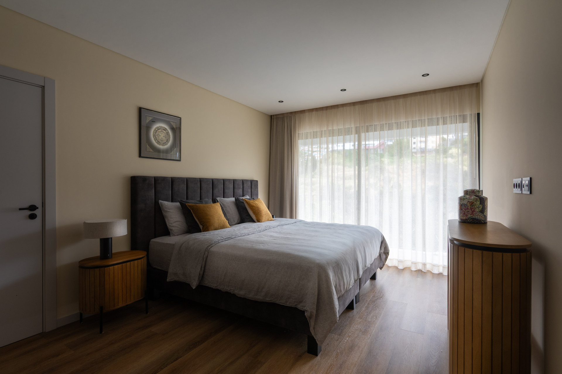 Bedroom with wooden dresser