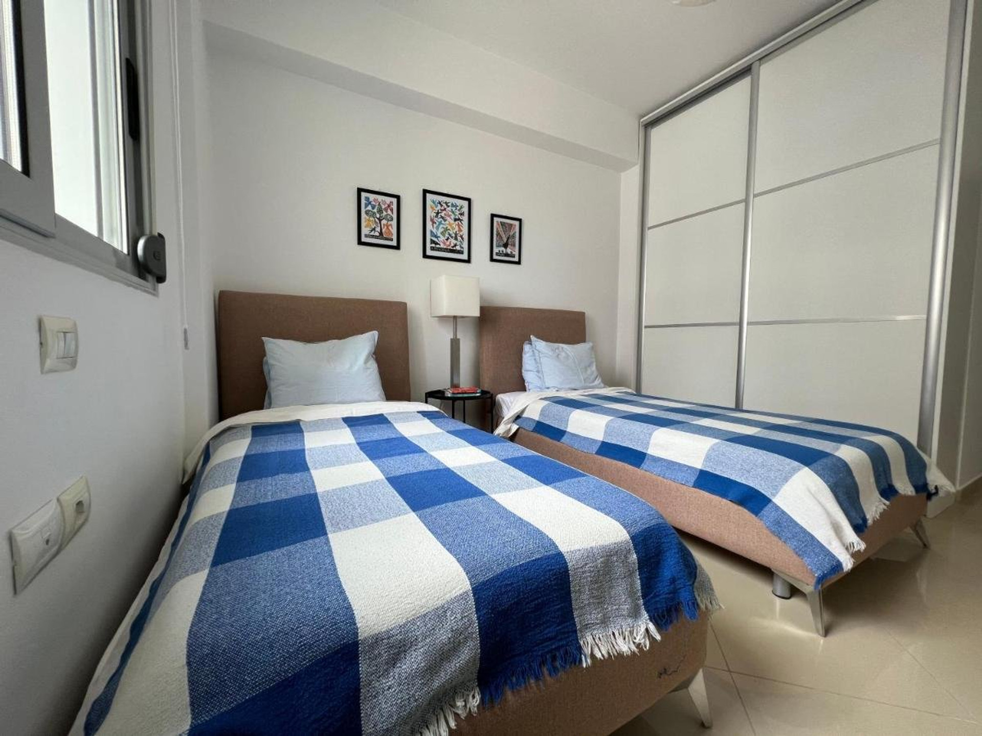 Twin bedroom with wardrobe