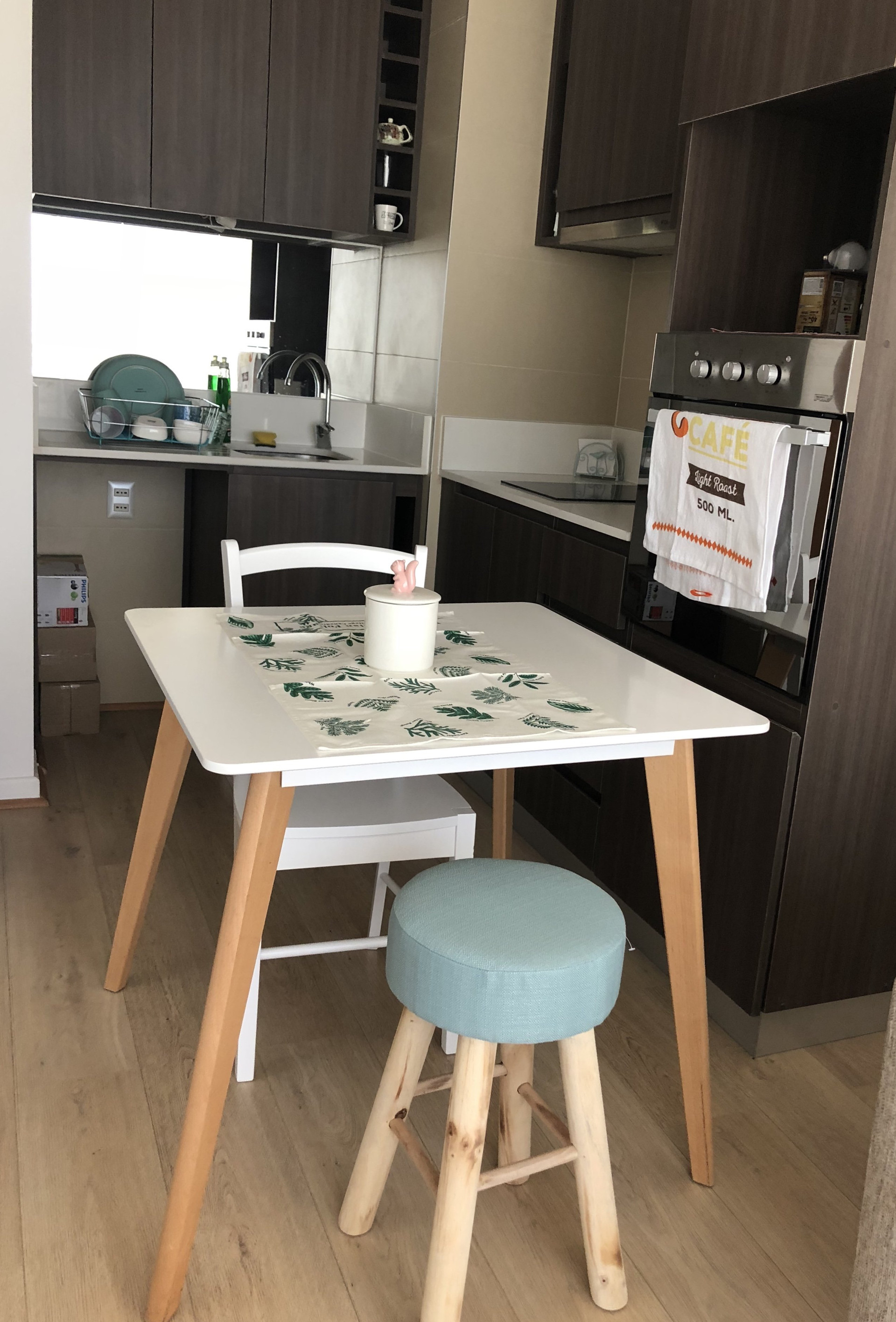Kitchen with dining table and oven