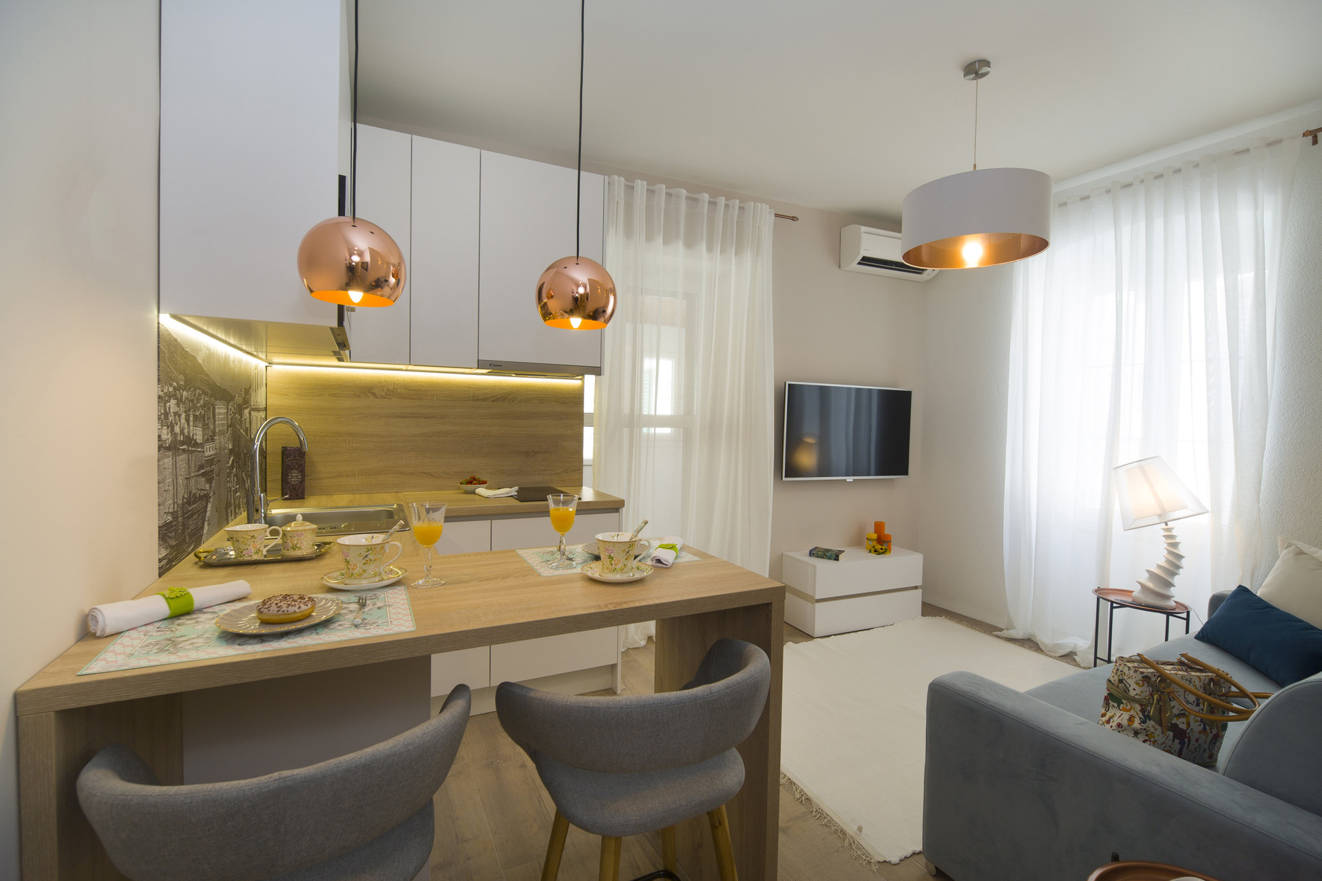 The heart of the home: a cozy dining area and lounge with flat-screen cable TV.