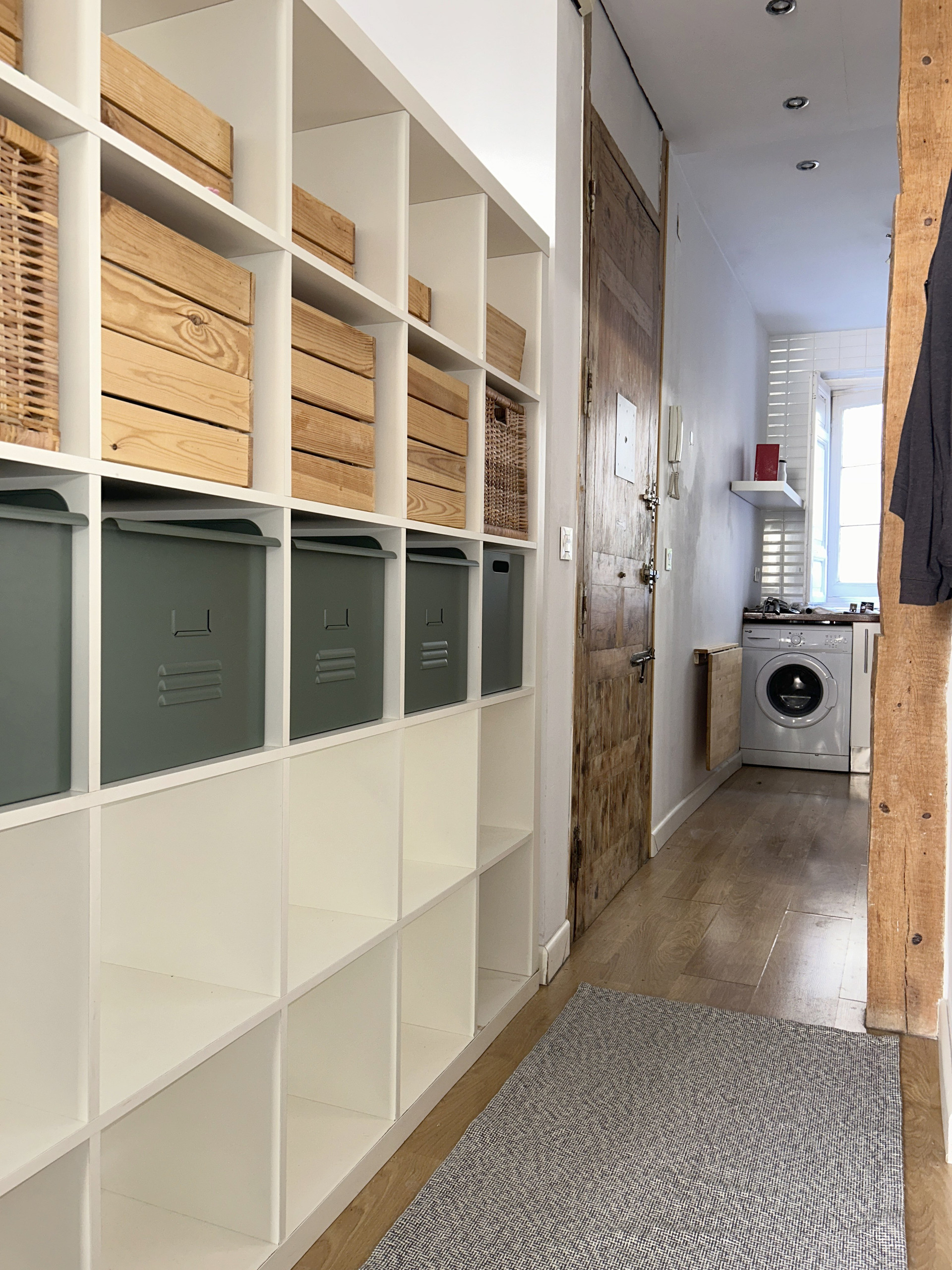 Hallway with shelving and entrance
