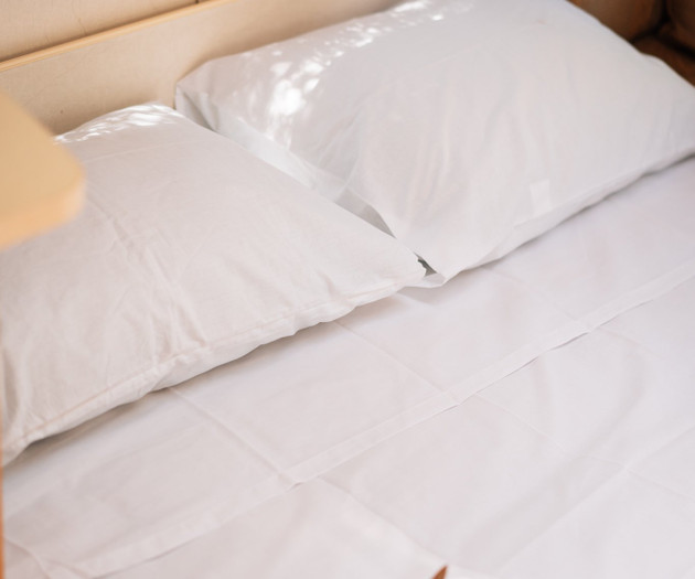 Bed with white linens