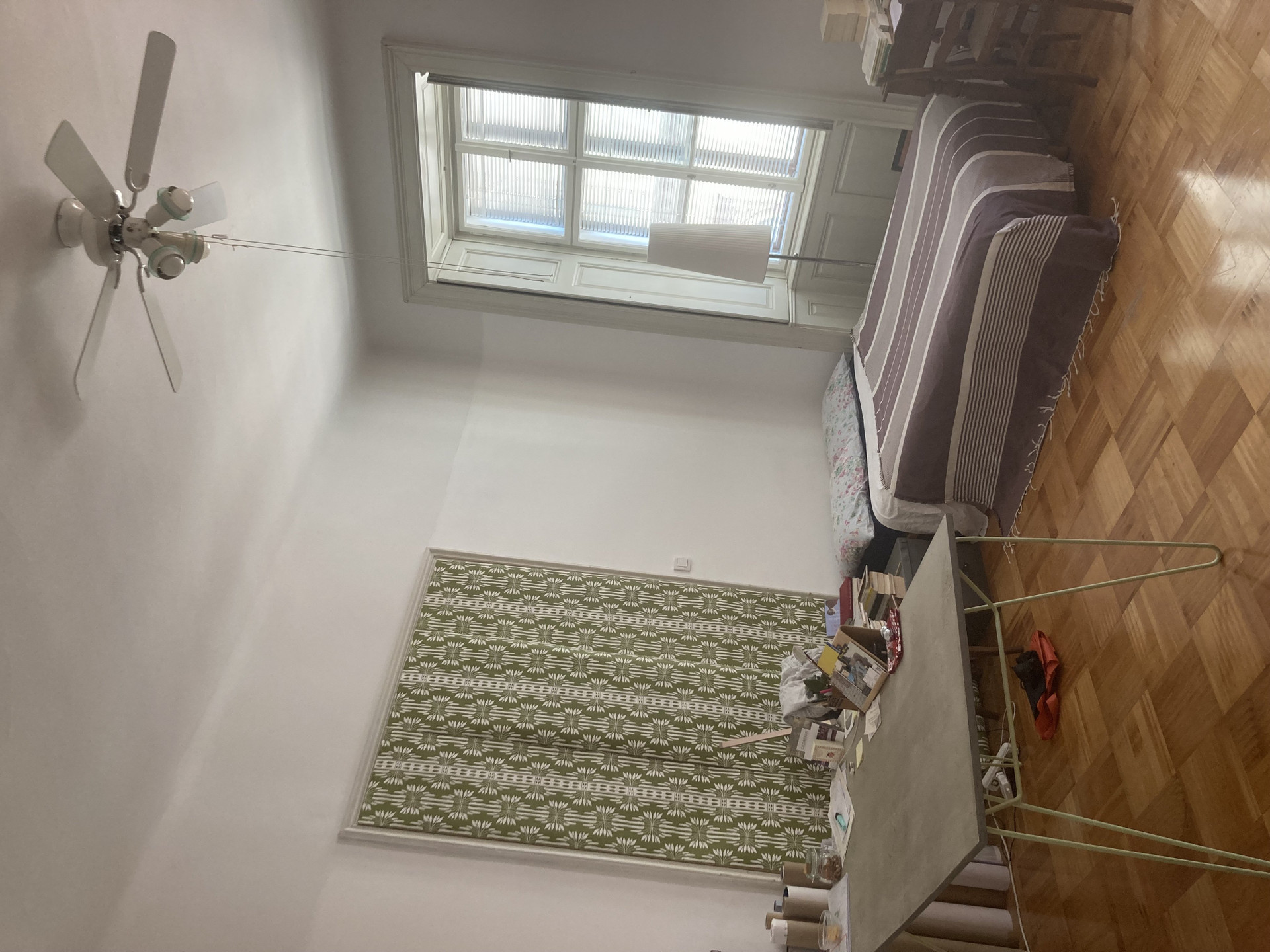 Bedroom with bed and rug