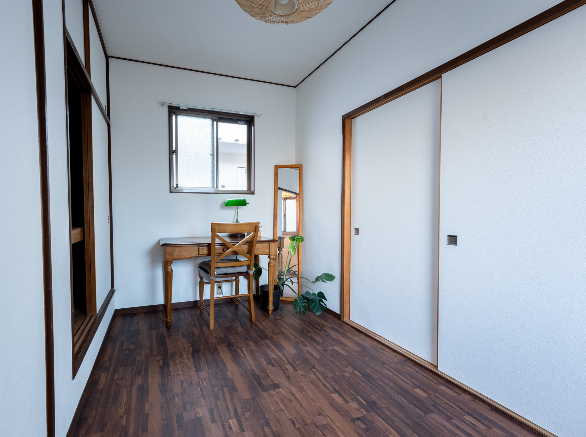 Bedroom with desk and closet