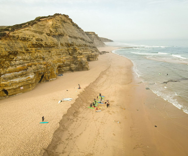 Aerial beach view with cliffs
