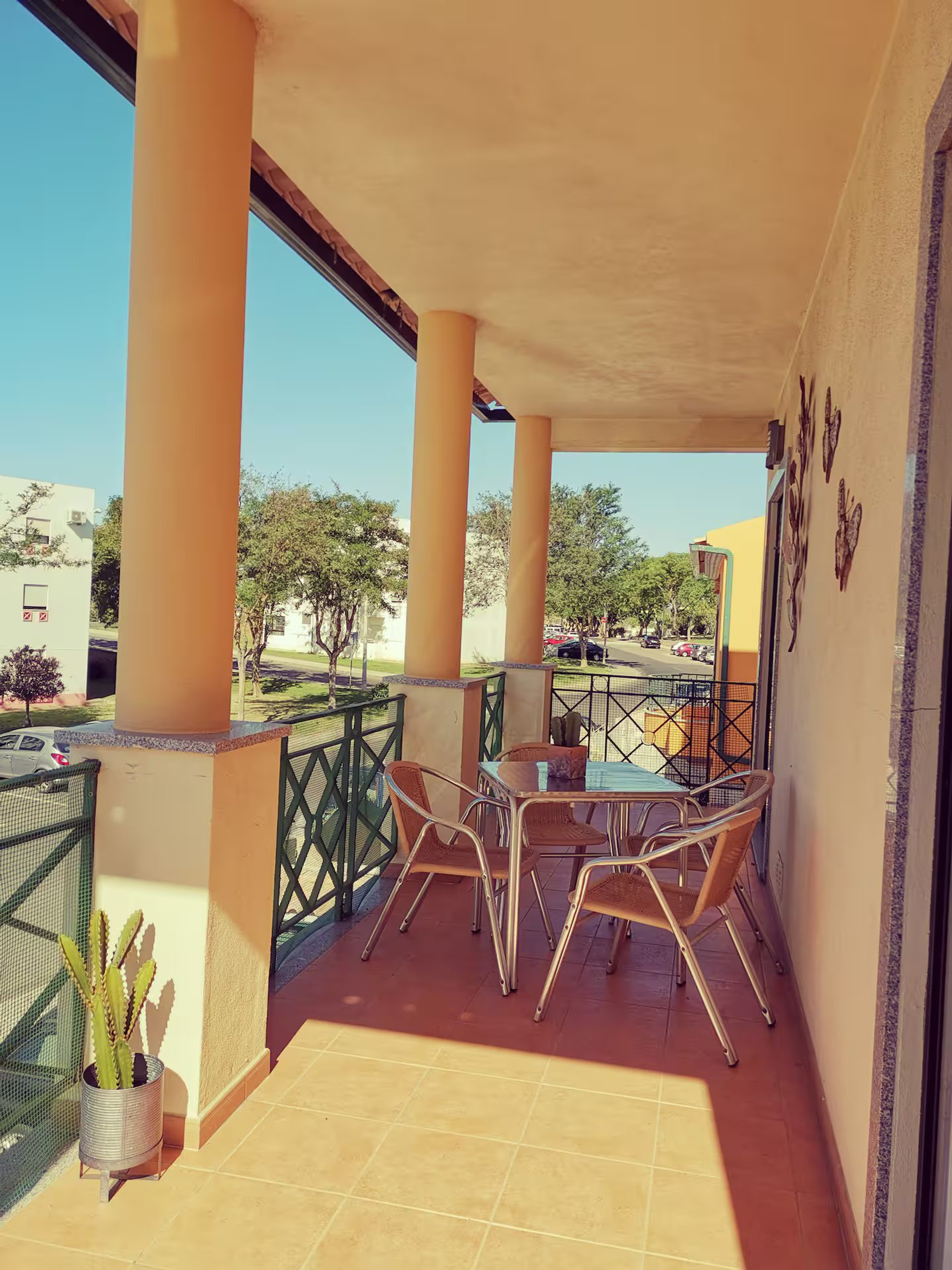 Balcony with dining table.