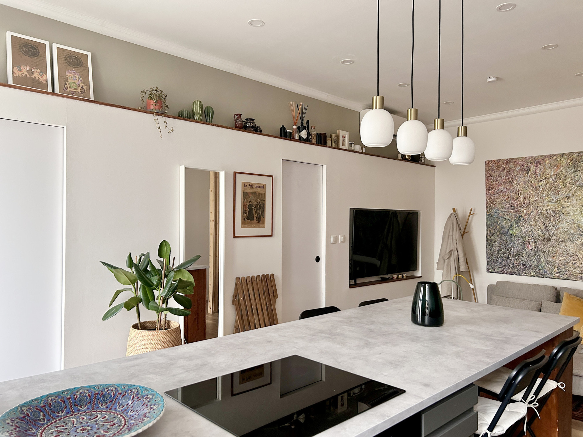 A view of the living room and the kitchen island
