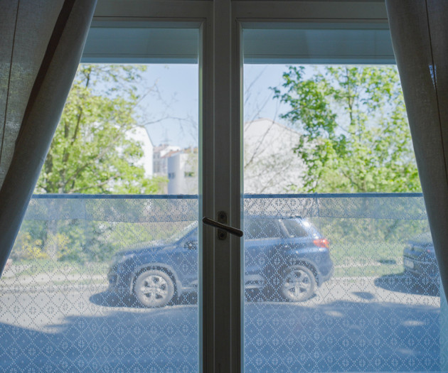 Window view of parking area