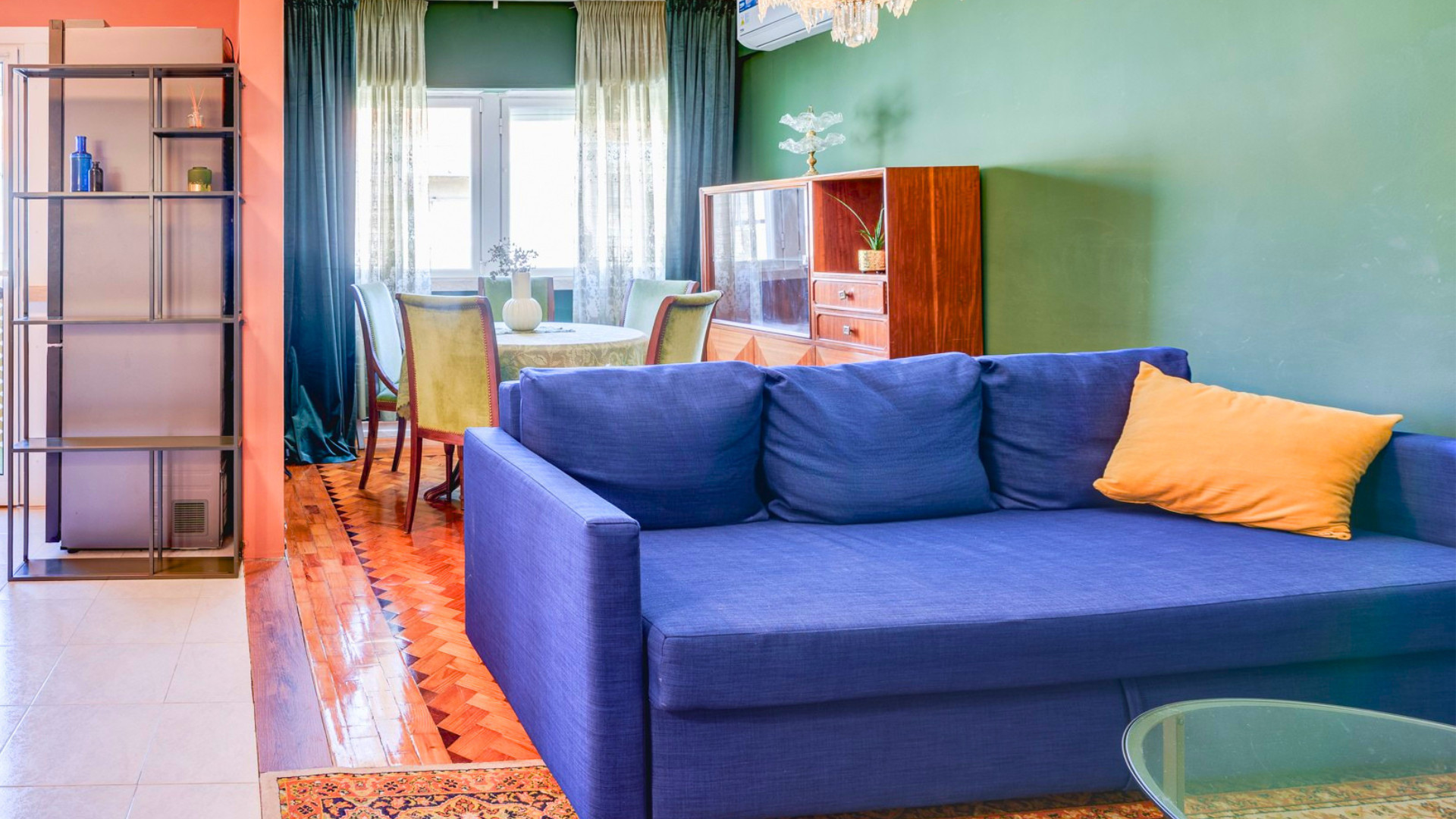 Blue sofa living and dining area
