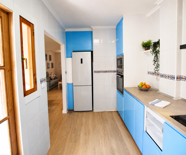 Kitchen hallway with fridge