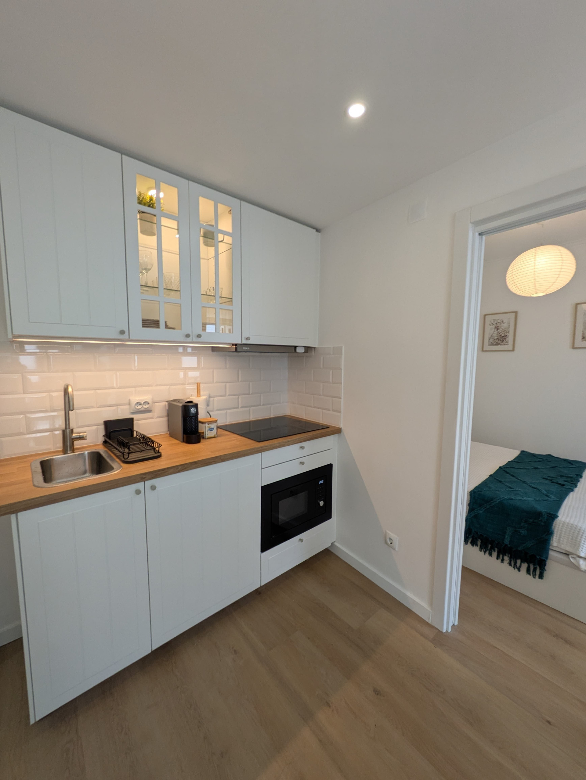Kitchen with view to bedroom