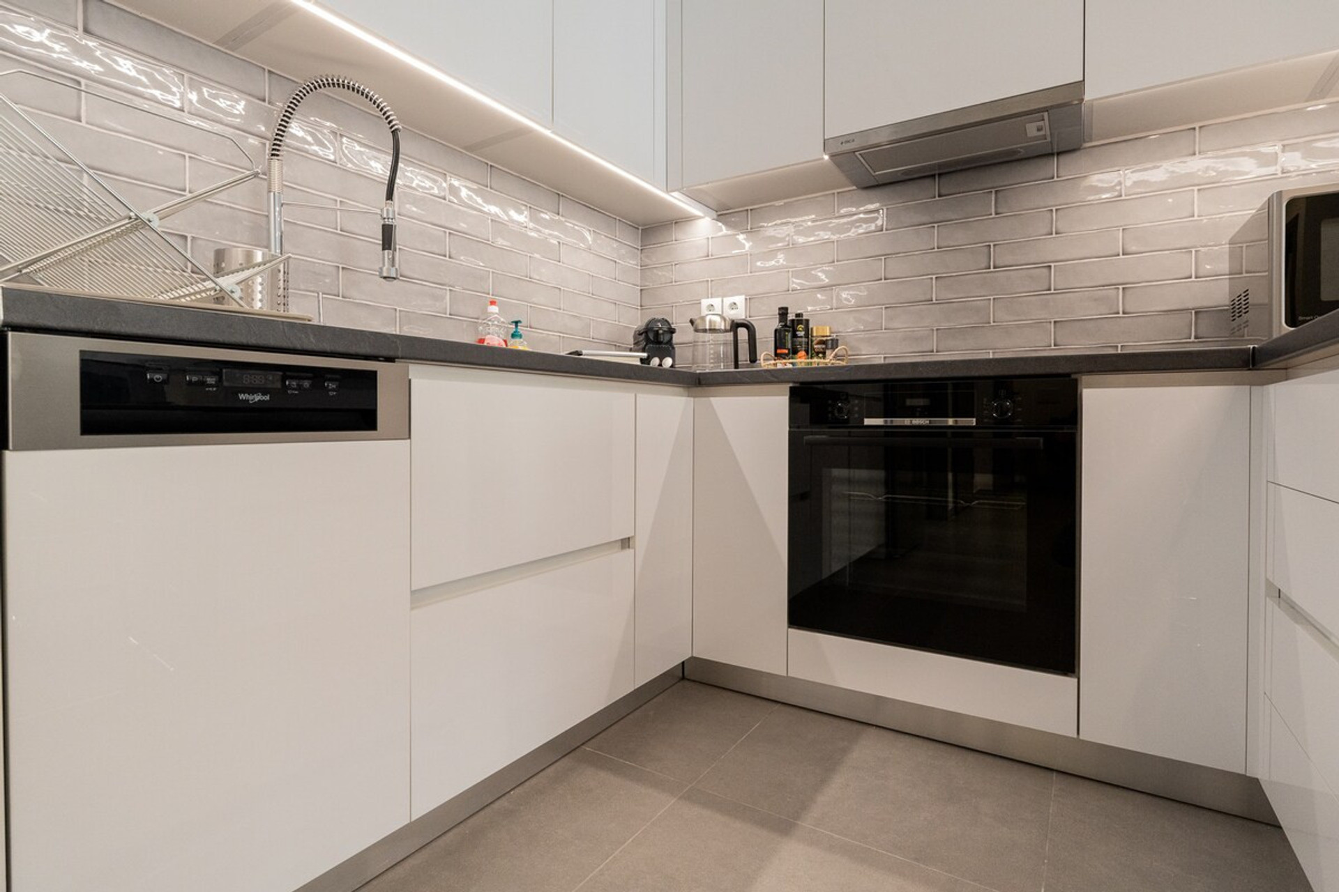 All necessary small appliances and kitchen stove 