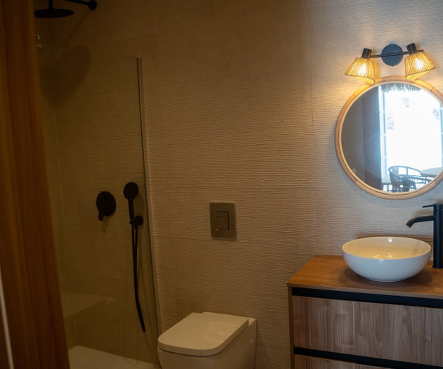 Bathroom with shower and sink