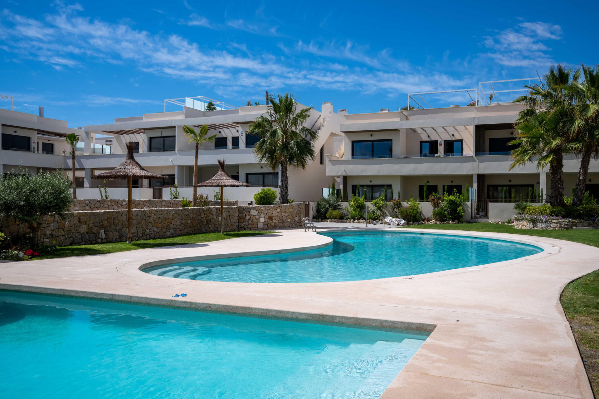 Large community pool and building