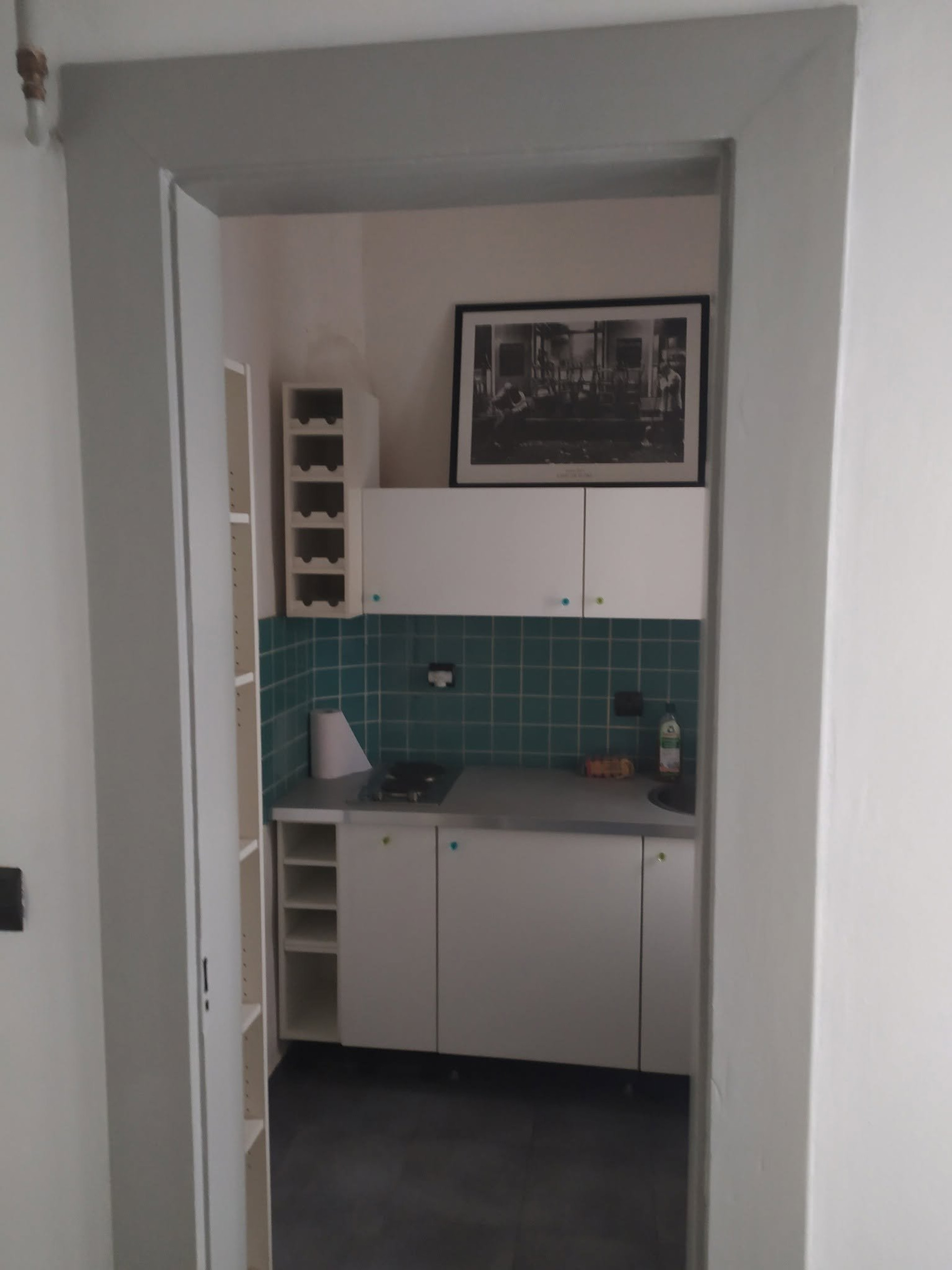 Compact kitchen with stove and sink