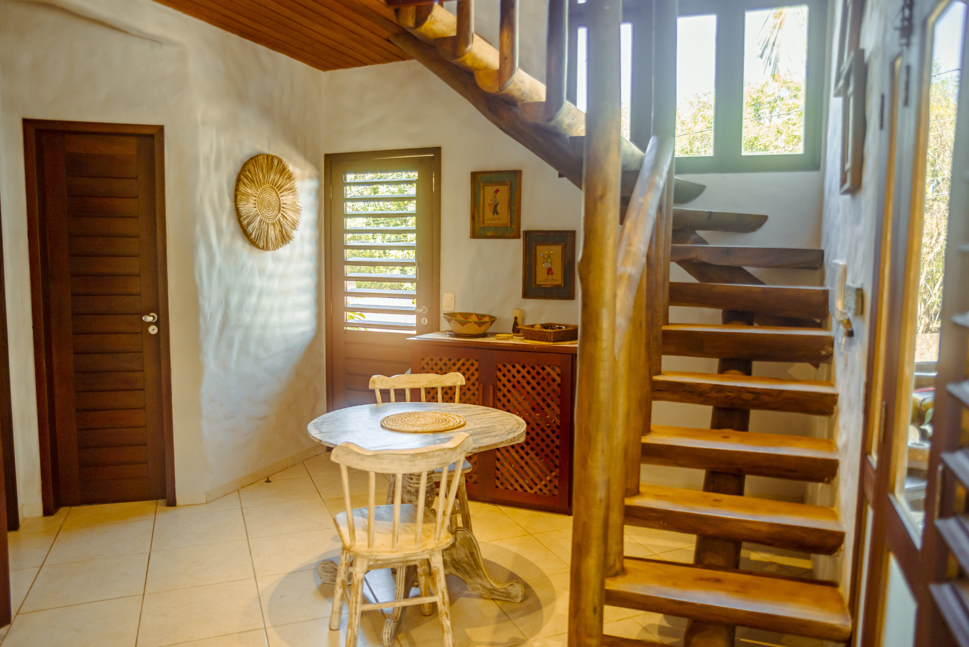 Dining area with log staircase