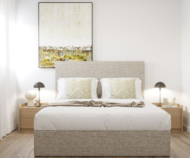 Bedroom with tweed upholstered headboard