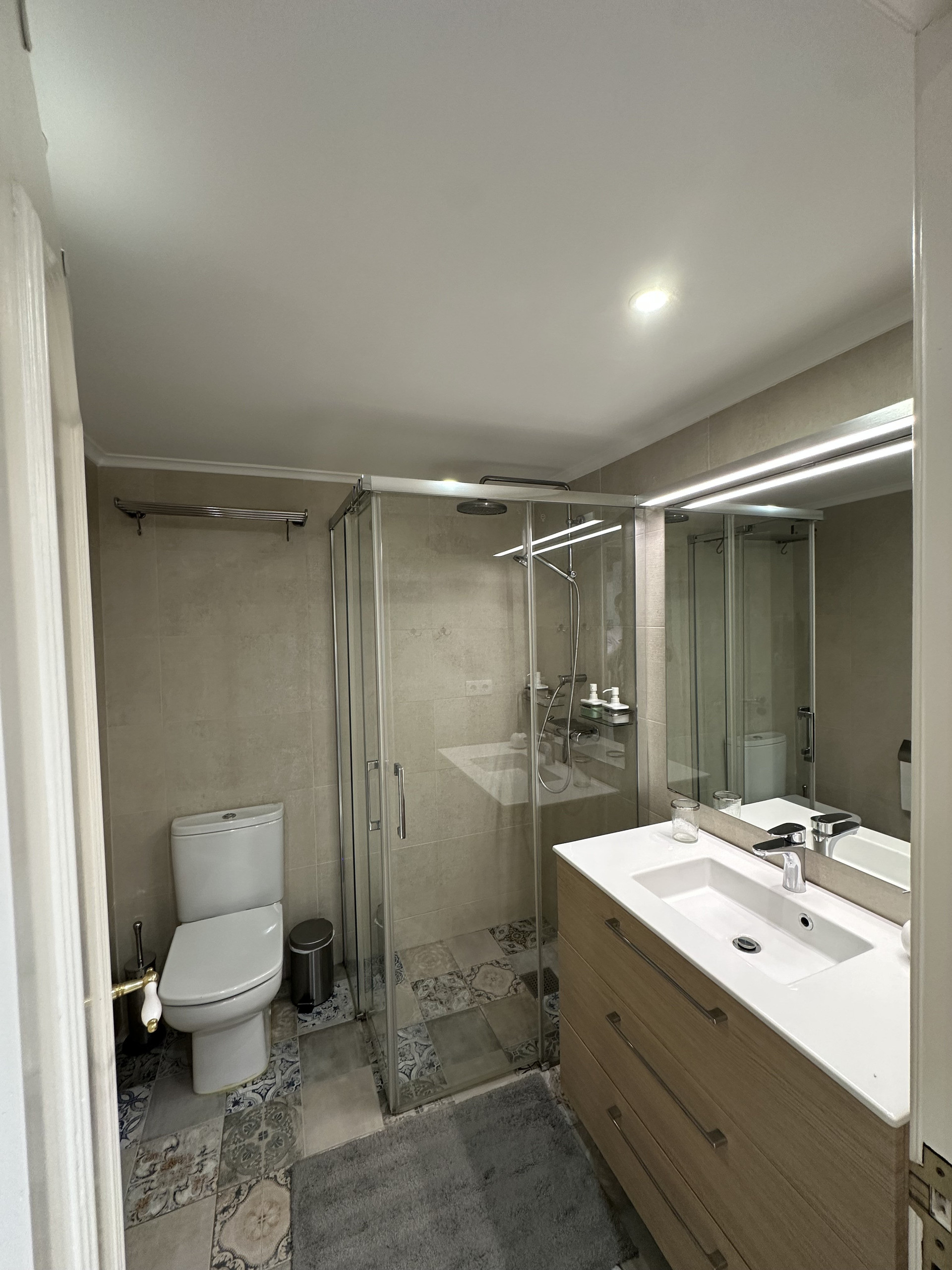 Bathroom with shower and vanity