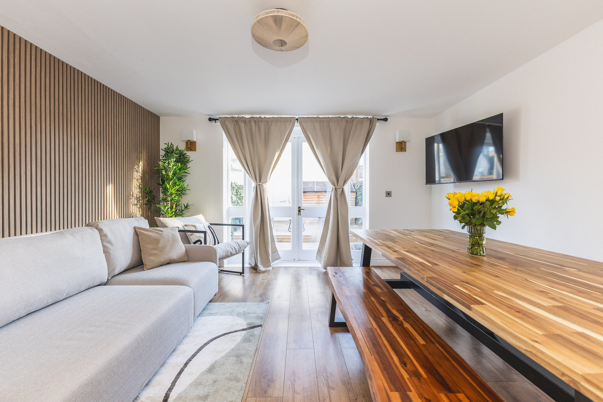 Bright living room with dining table