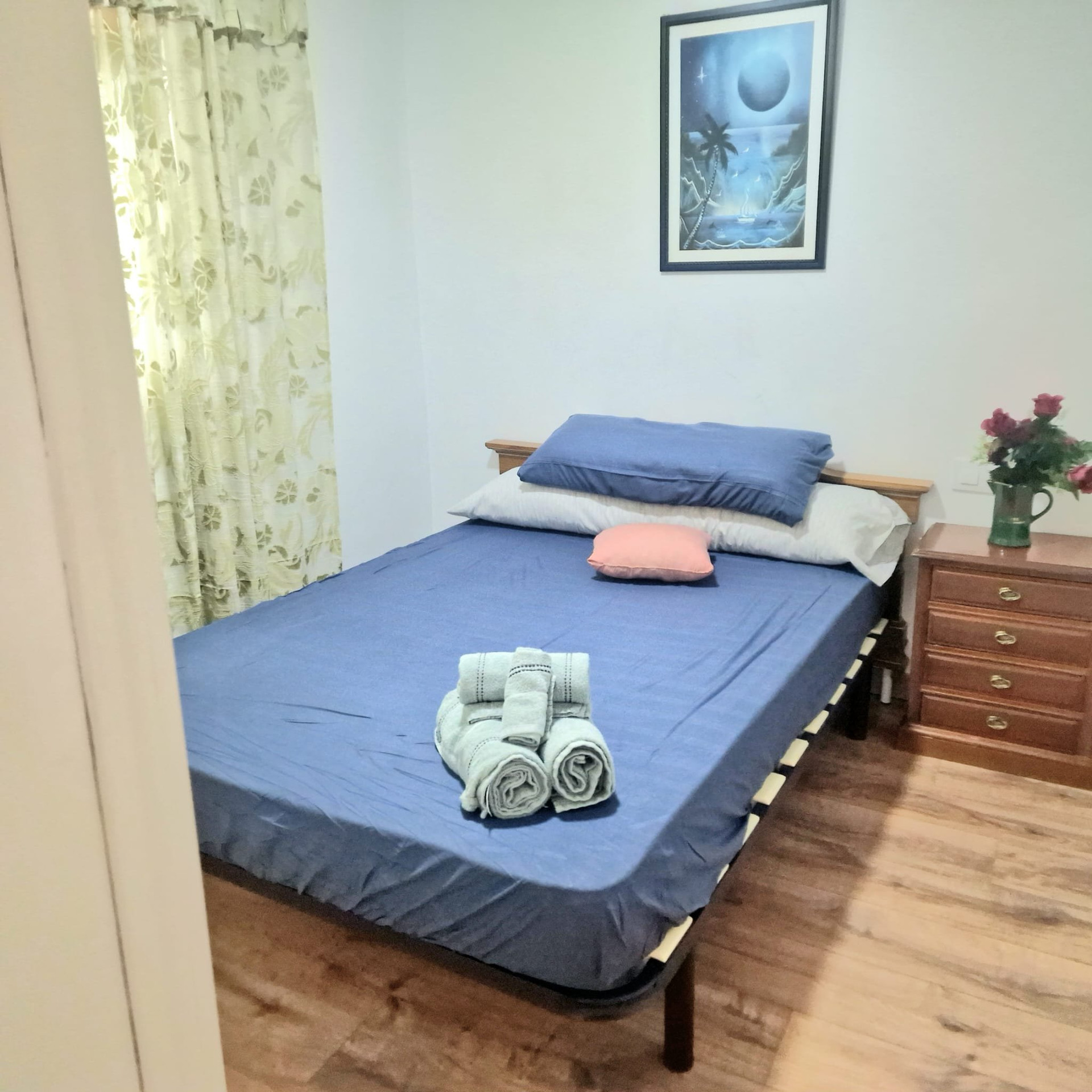 Double bedroom with blue bedding