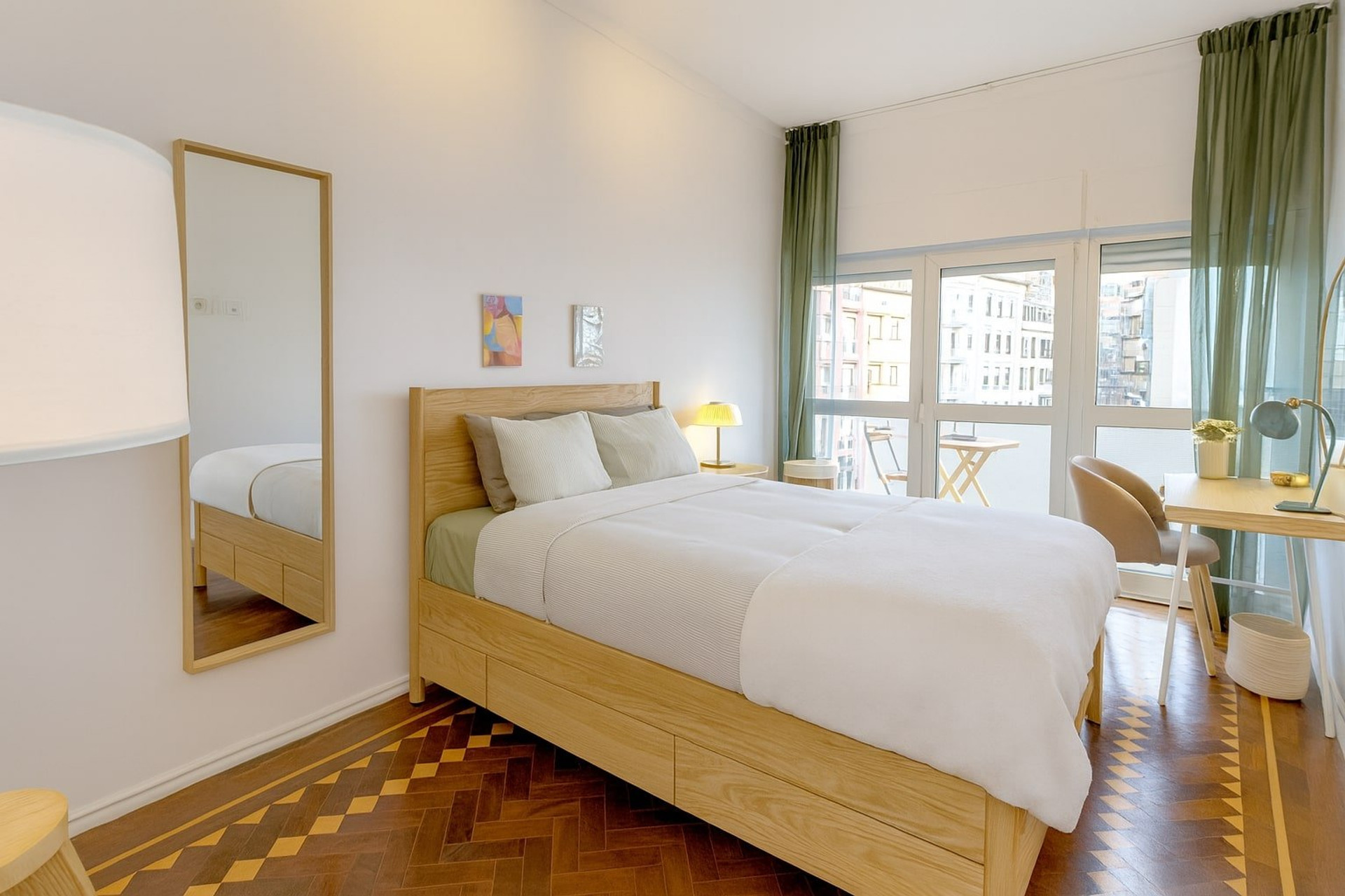 Bright bedroom with parquet floor