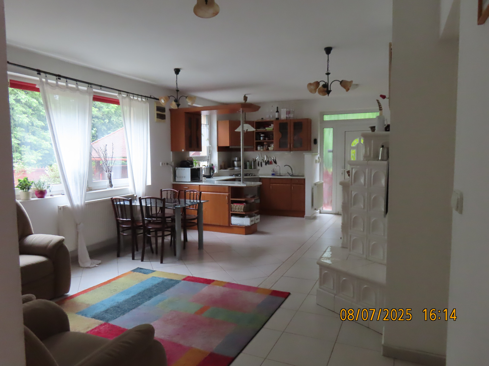 Living room with kitchen corner