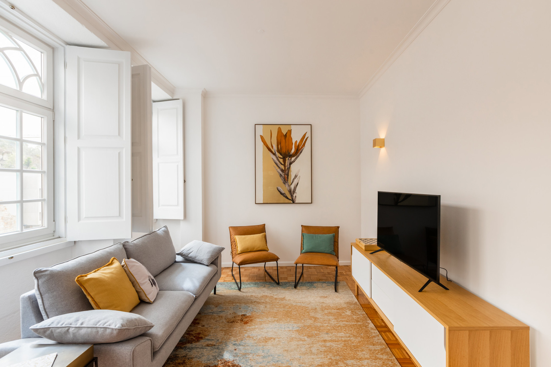 Living Room with Flat-Screen TV and Dining Table
