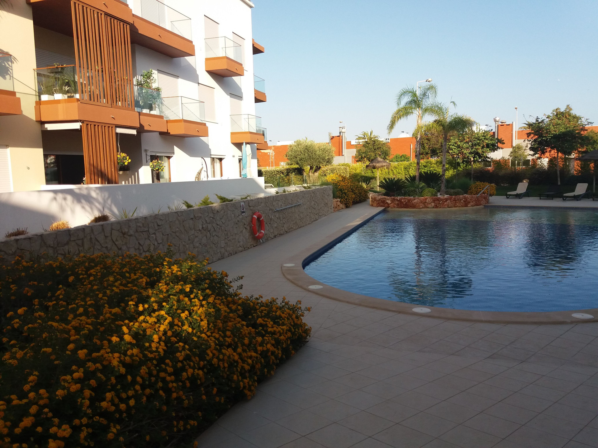 Pool area with sun loungers