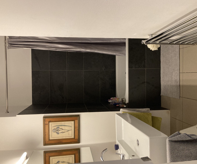 Bathroom with sink and tiles