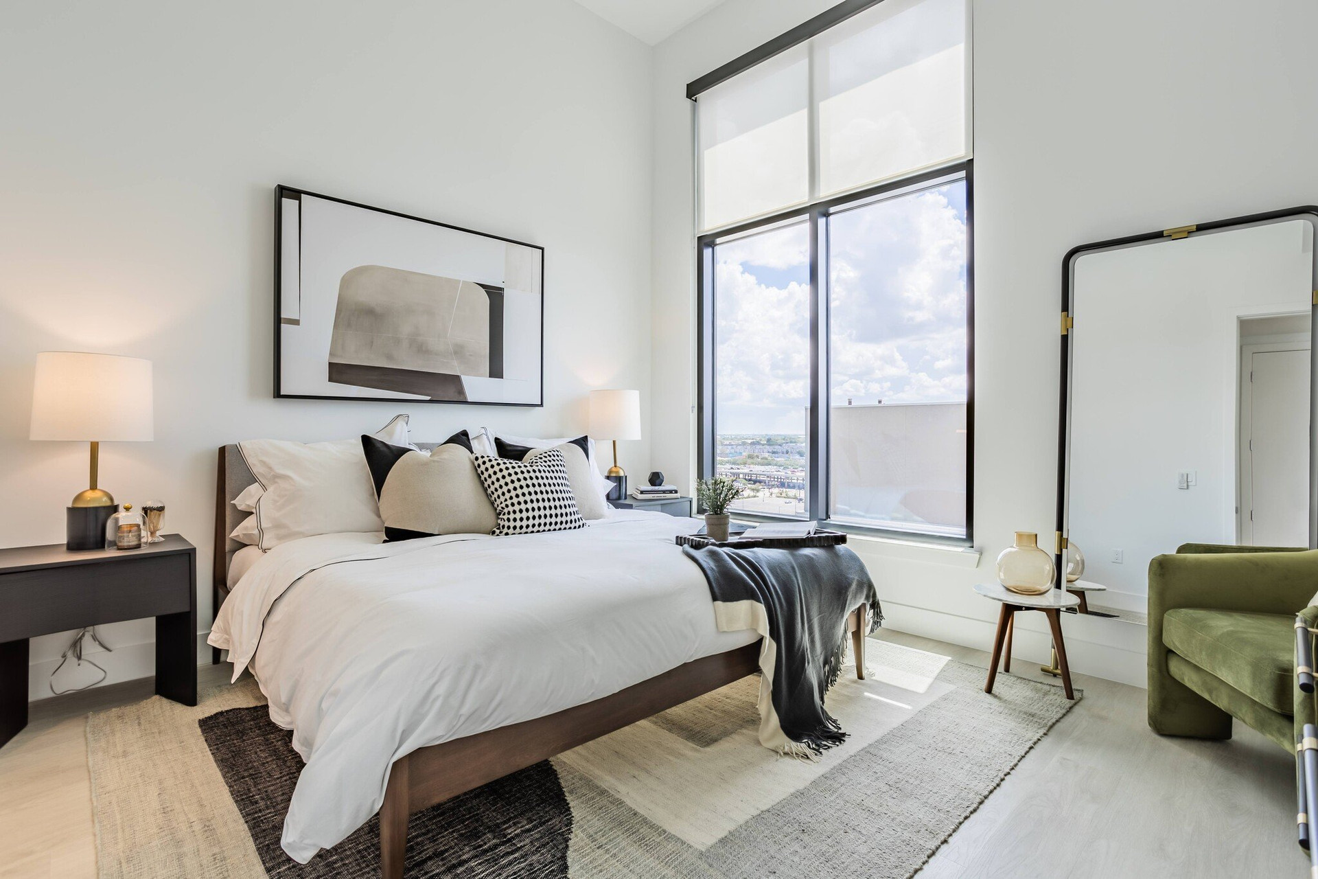 Bright bedroom with large window