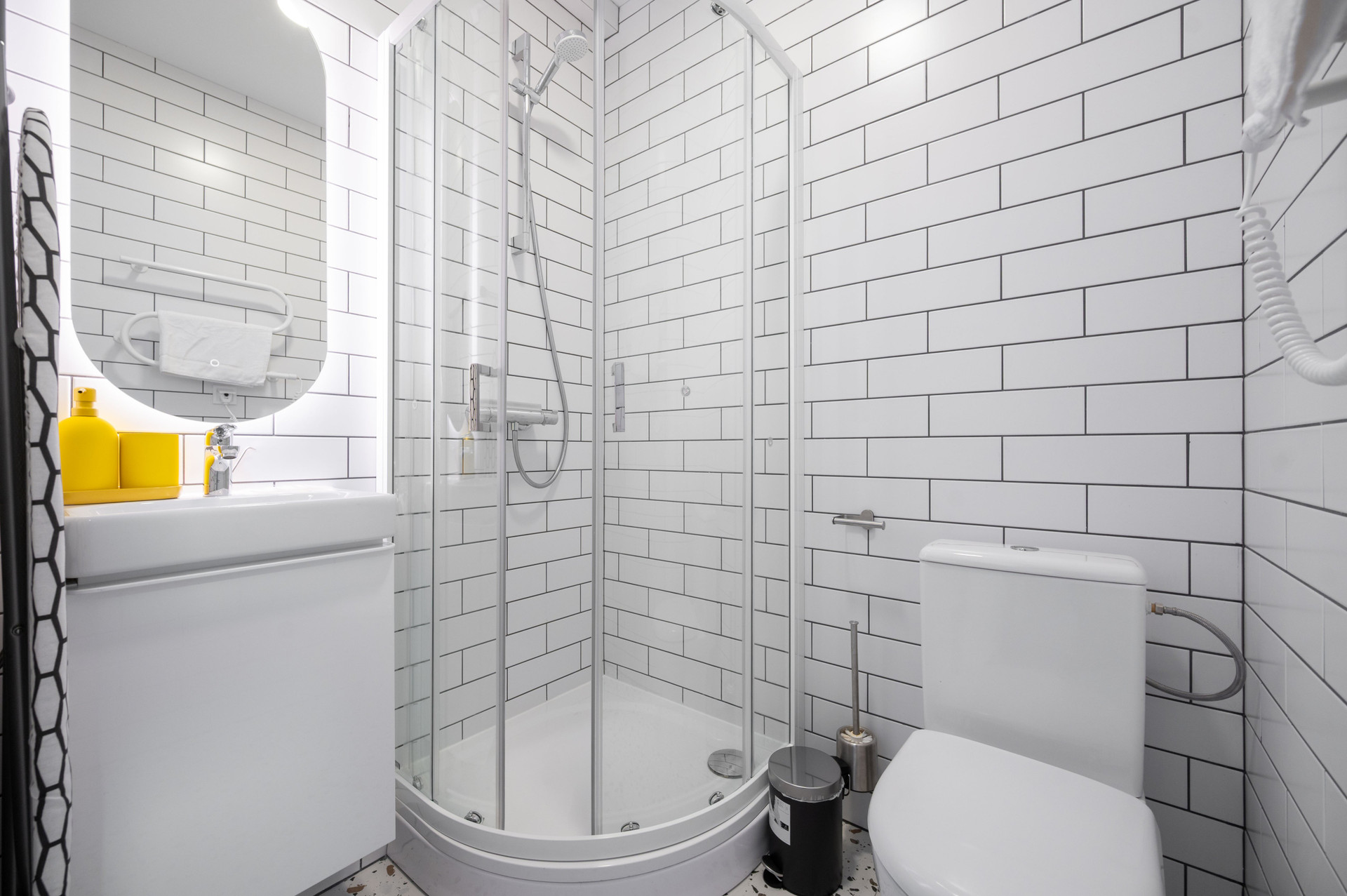 Bathroom with shower, sink and toilet